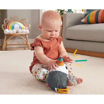 Fisher Price natahovací mávající Tukan