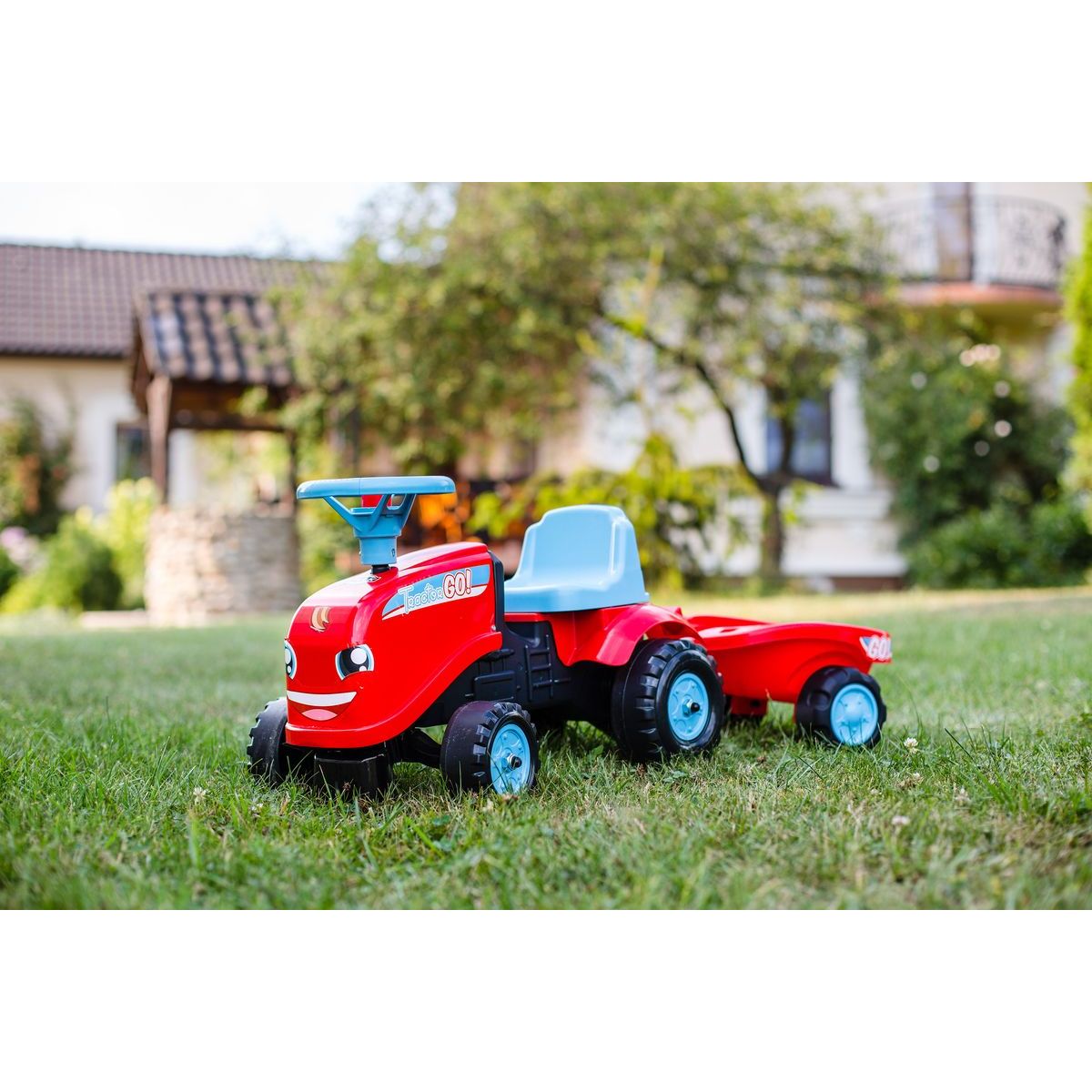 Falk Odstrkovadlo traktor Go Farm červené s volantem a valníkem