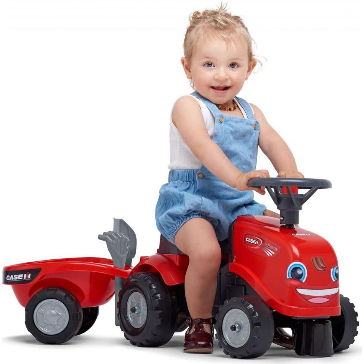 Falk Odstrkovadlo traktor Baby Case IH červený s vlečkou, lopatkou a hrabičkami