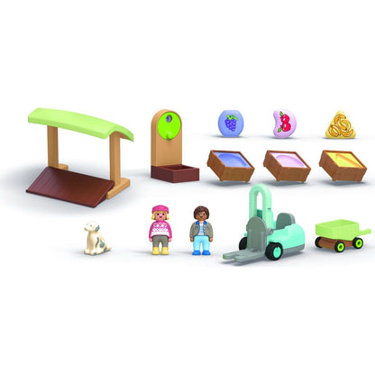 PLAYMOBIL® 71691 Junior: Stánek s biopotravinami a vysokozdvižný vozík
