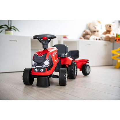Falk Odstrkovadlo traktor Baby Case IH červený s vlečkou, lopatkou a hrabičkami