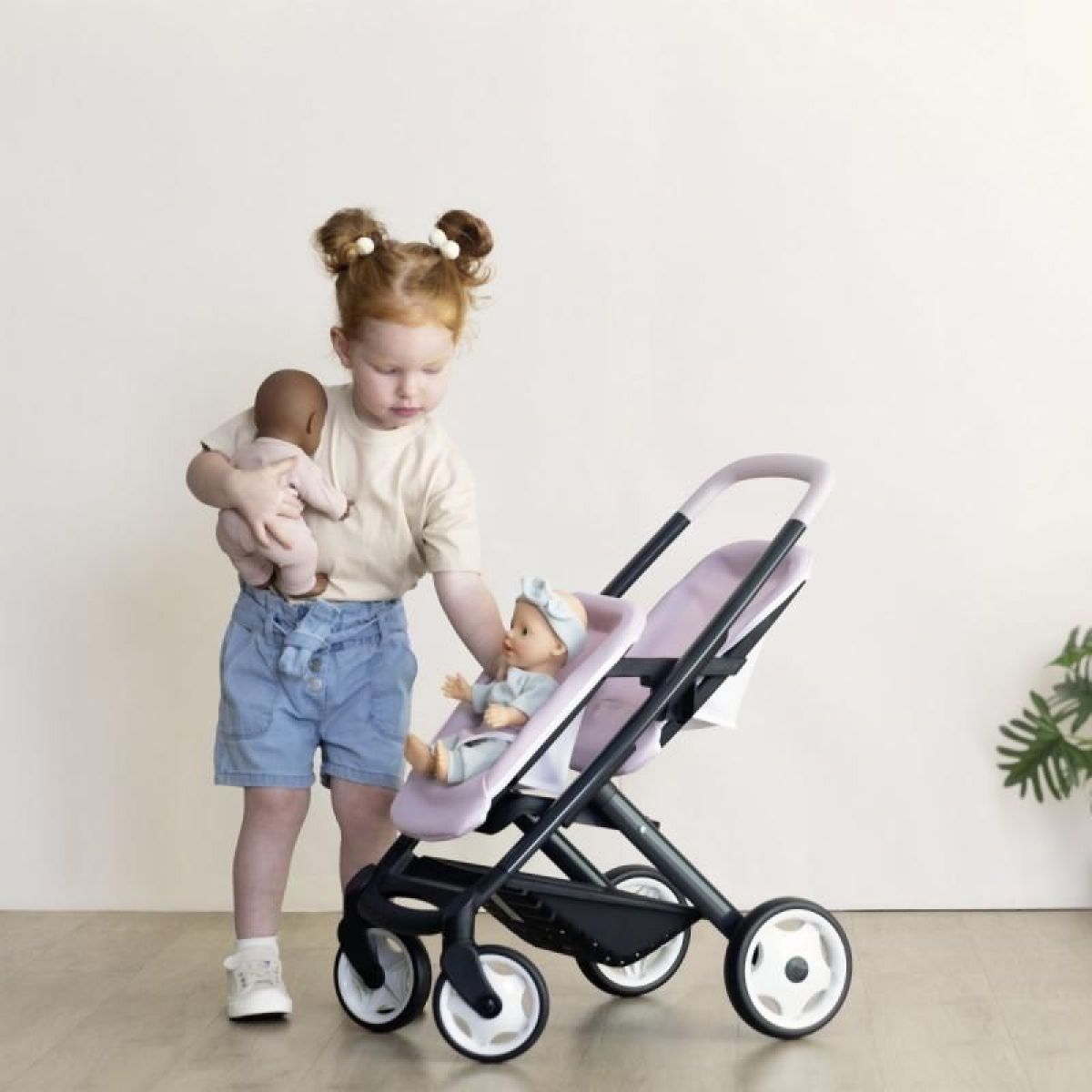 Smoby Sportovní kočárek pro panenky dvojčata Maxi Cosi sv. růžový